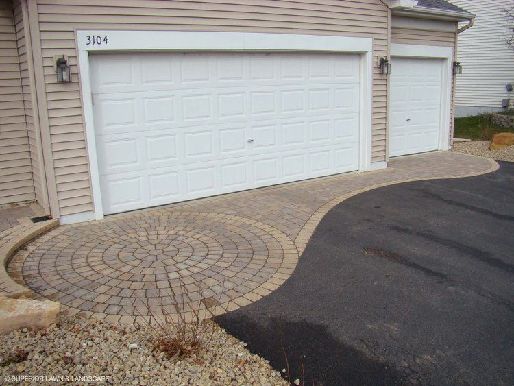 A white garage door with the number 1104 on it