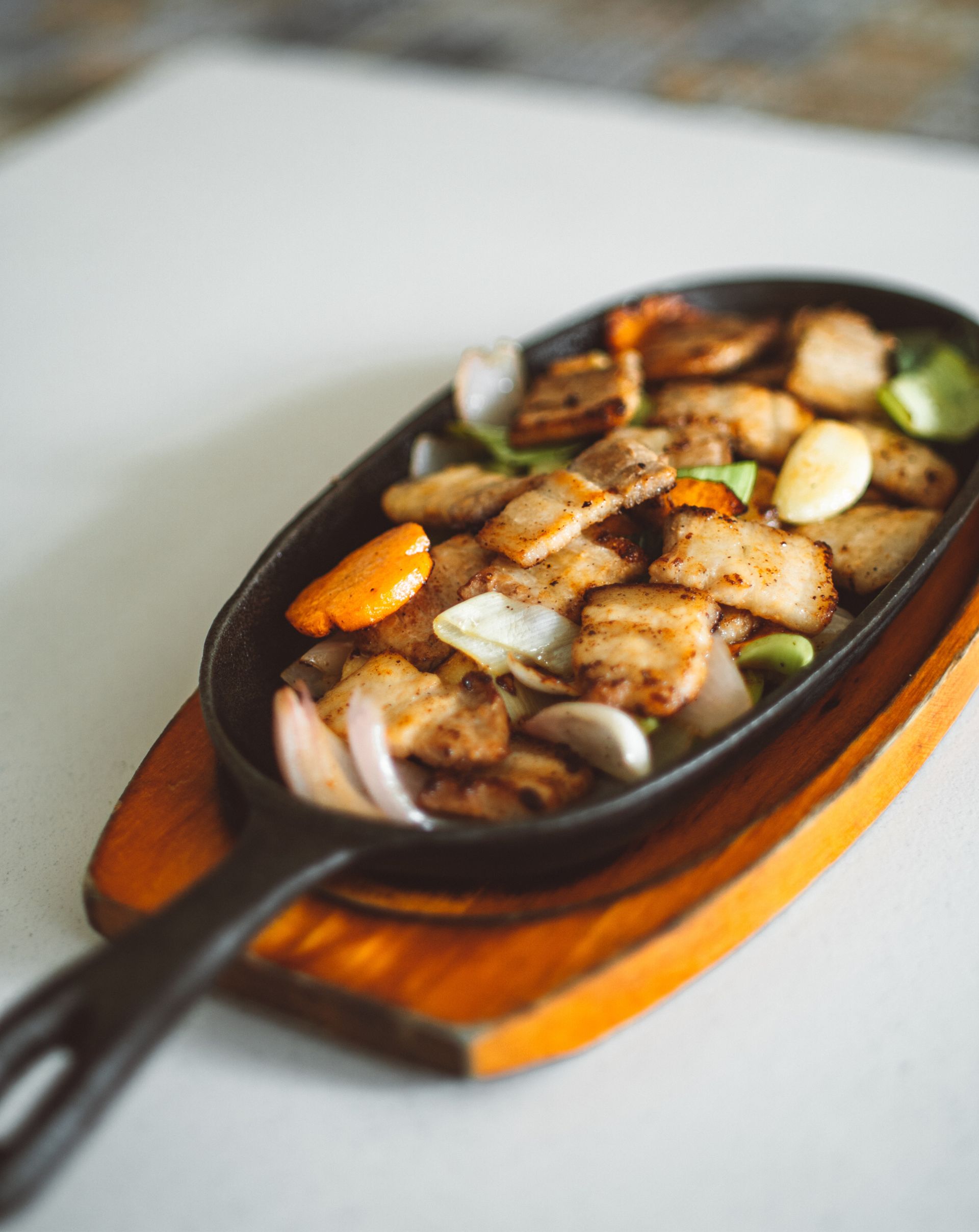 Photo of a meal served on a cast iron pan