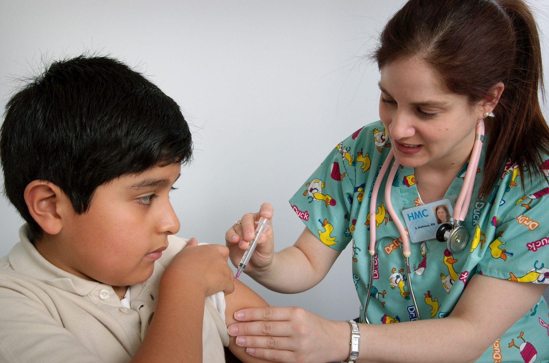 Vaccinating a boy
