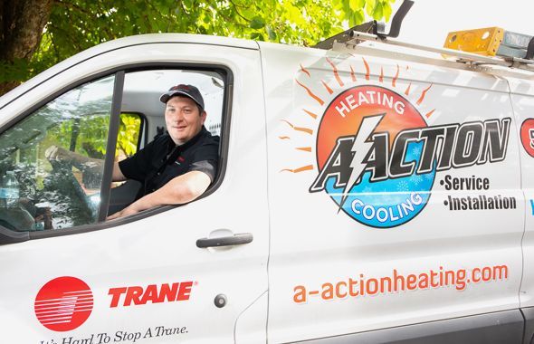 A-Action Heating & Cooling Inc staff driving a van