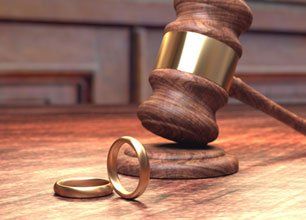 Gavel and rings on a desk