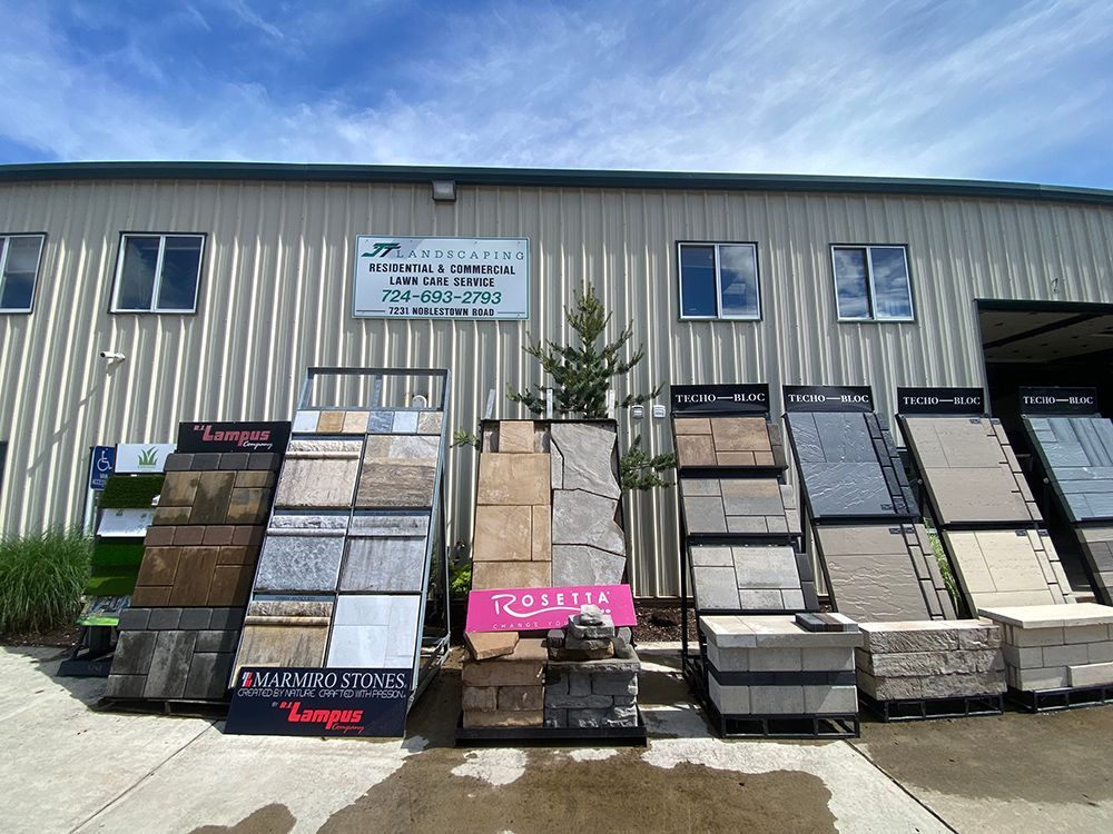A building with a lot of tiles on display in front of it