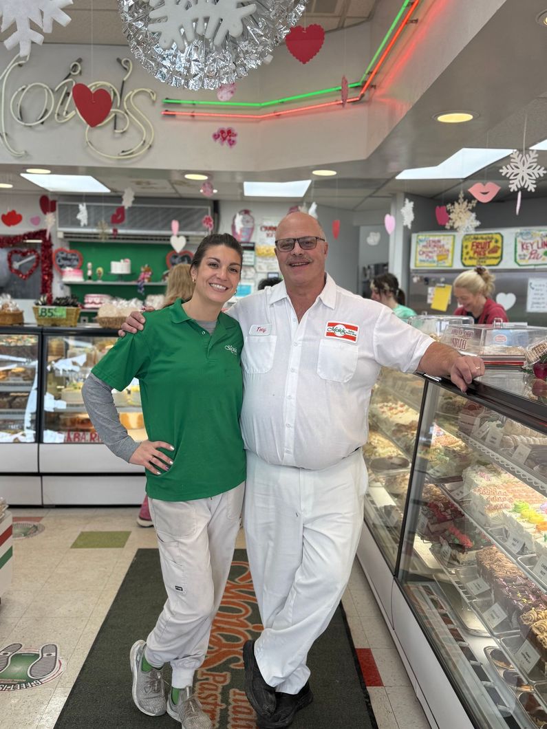 Silhouette of a person with a neutral expression against a gray background.