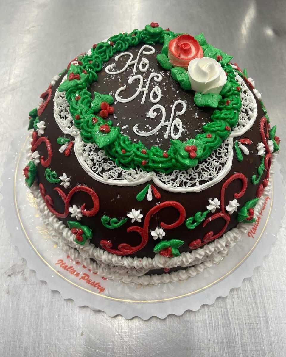 Chocolate cake decorated with Christmas frosting. Includes