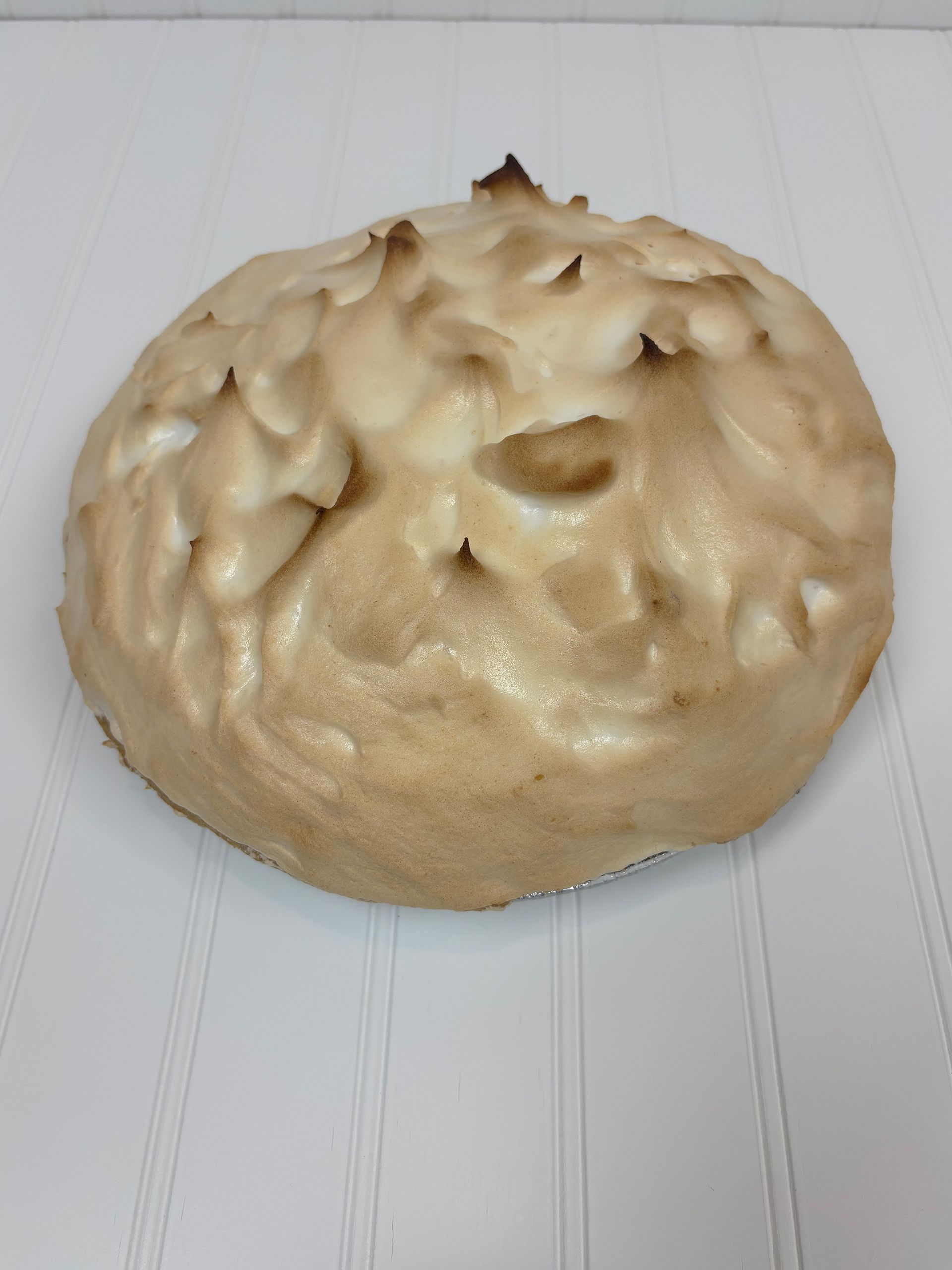 Lemon meringue pie with toasted meringue topping.