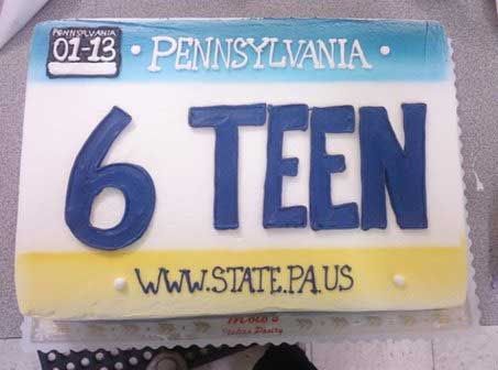 Cake decorated as a Pennsylvania license plate that reads
