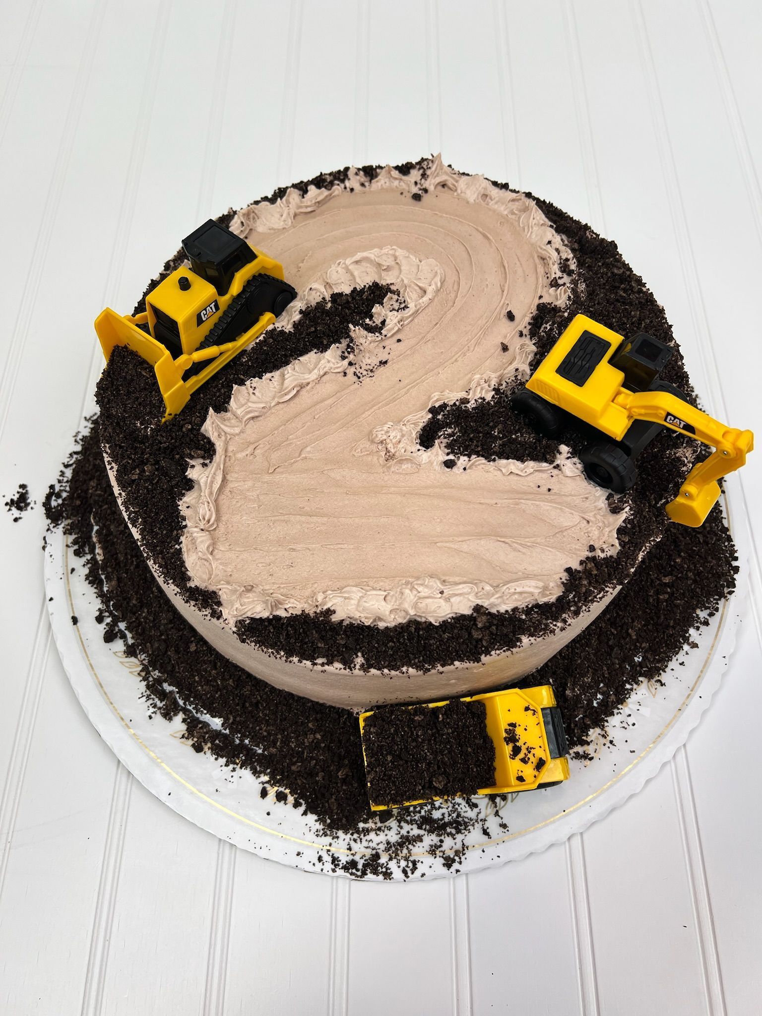 Birthday cake decorated with chocolate frosting