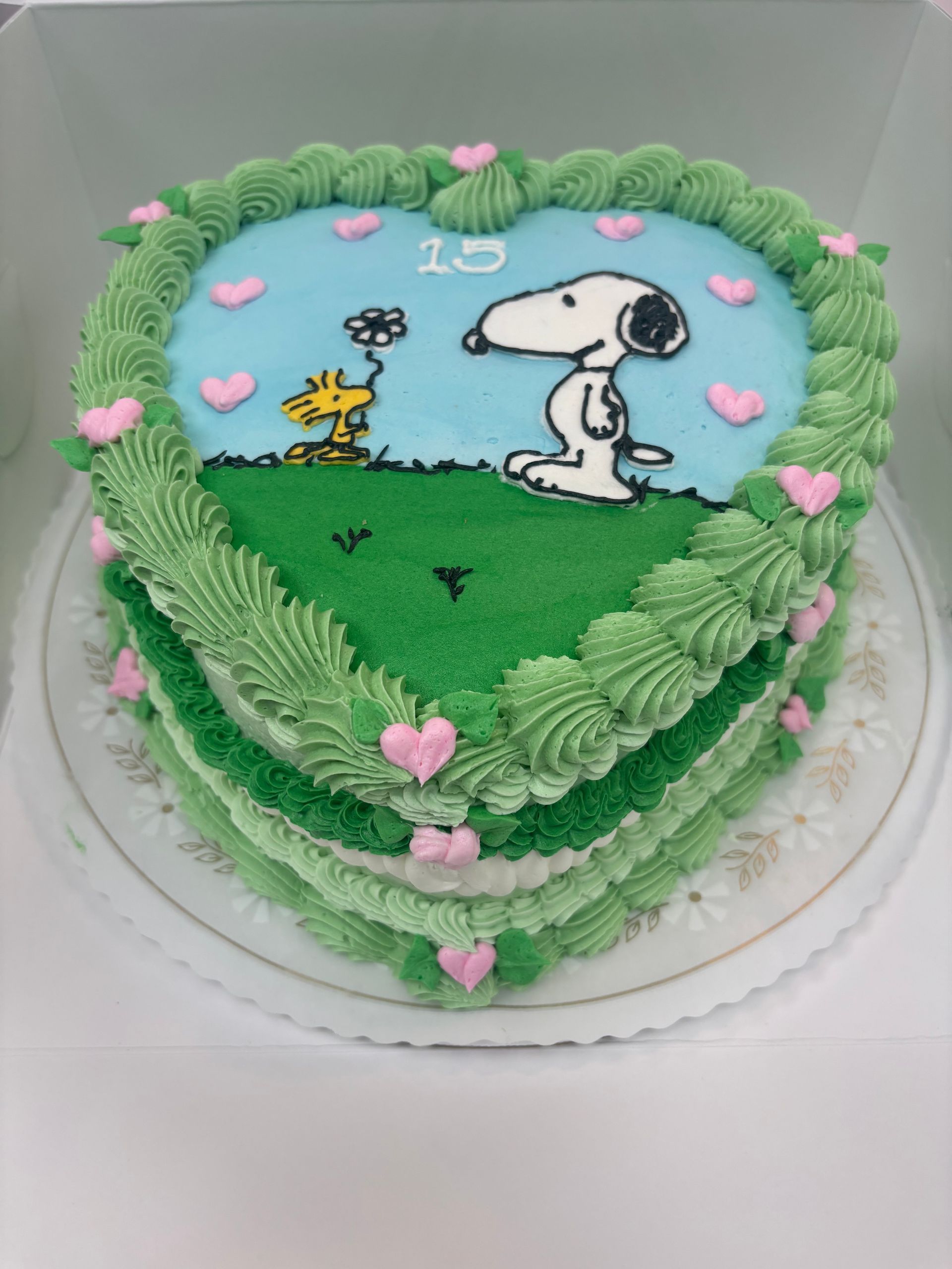 Heart-shaped cake with Snoopy and Woodstock