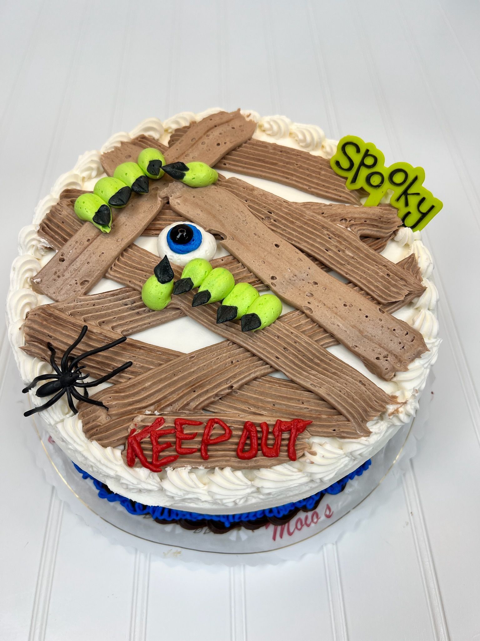 Halloween cake decorated as a mummy with