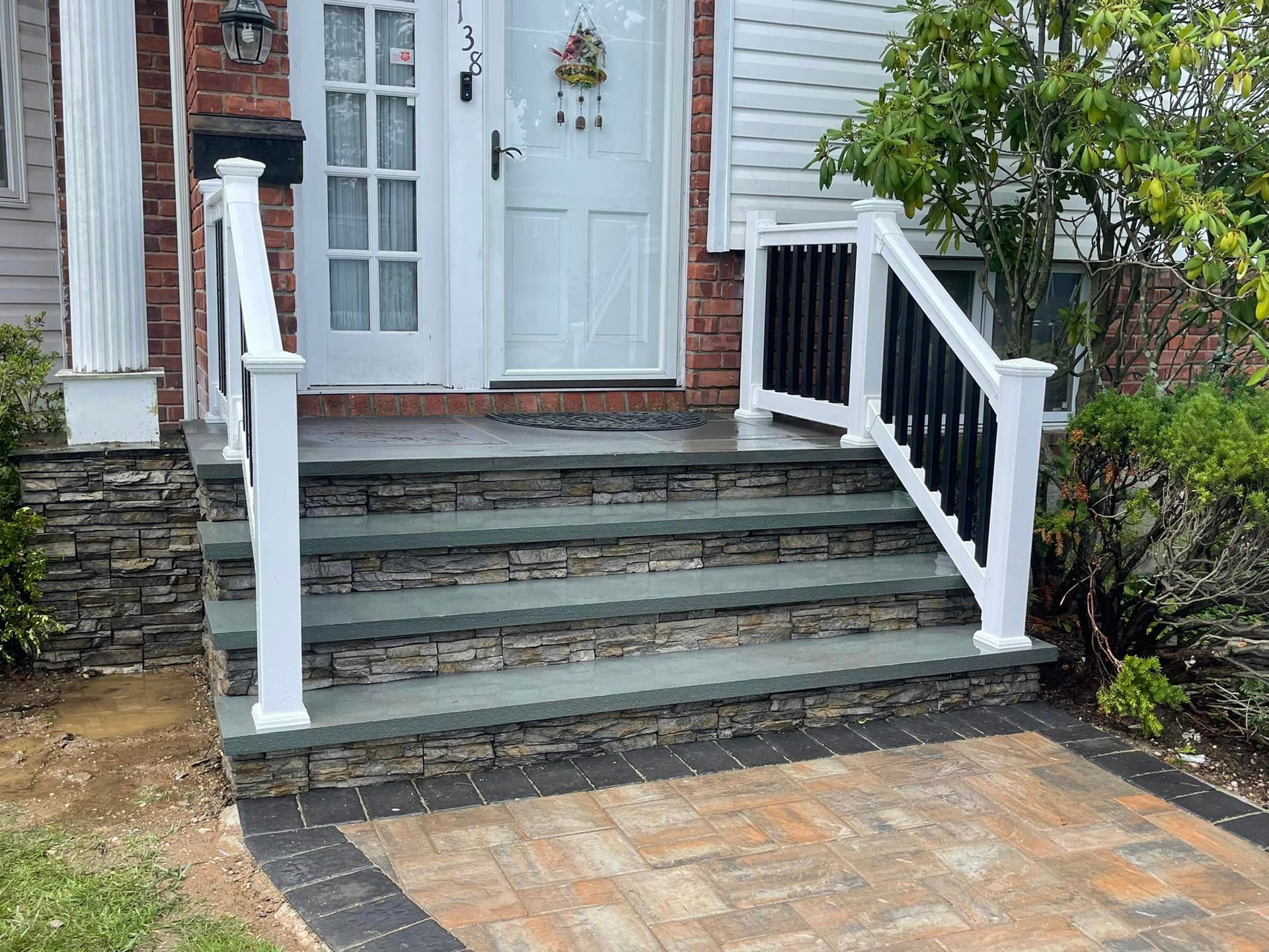 brick stairs with white stair case