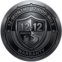 Black warranty badge reading 12-12 months/miles and 12-month/12,000-mile warranty