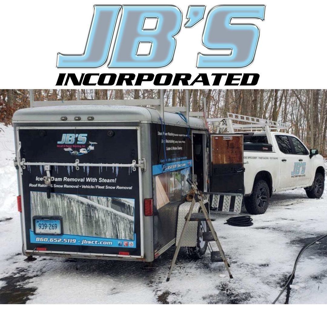 A jb 's incorporated truck is parked in the snow