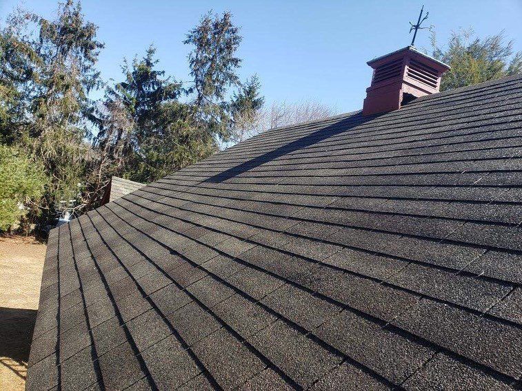 A roof with a chimney on top of it