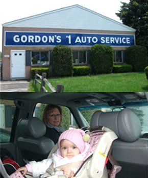 Gordon's No 1 Auto Service shop and woman and baby in the car