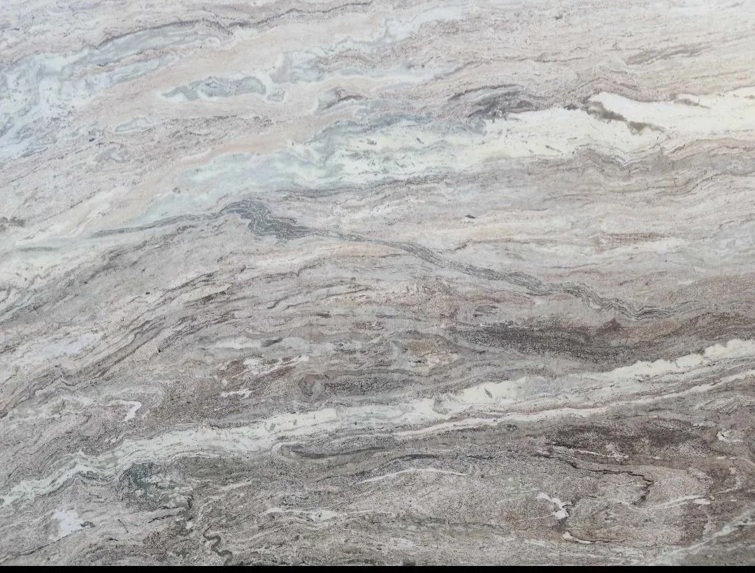 Swirling gray, tan, and white marble pattern, resembling flowing water.