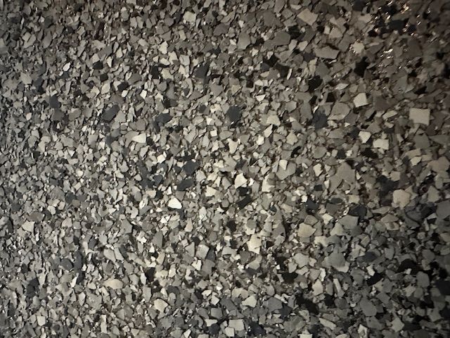 A close up of a pile of rocks on the ground.