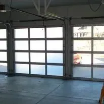Three glass garage doors. Inside view.
