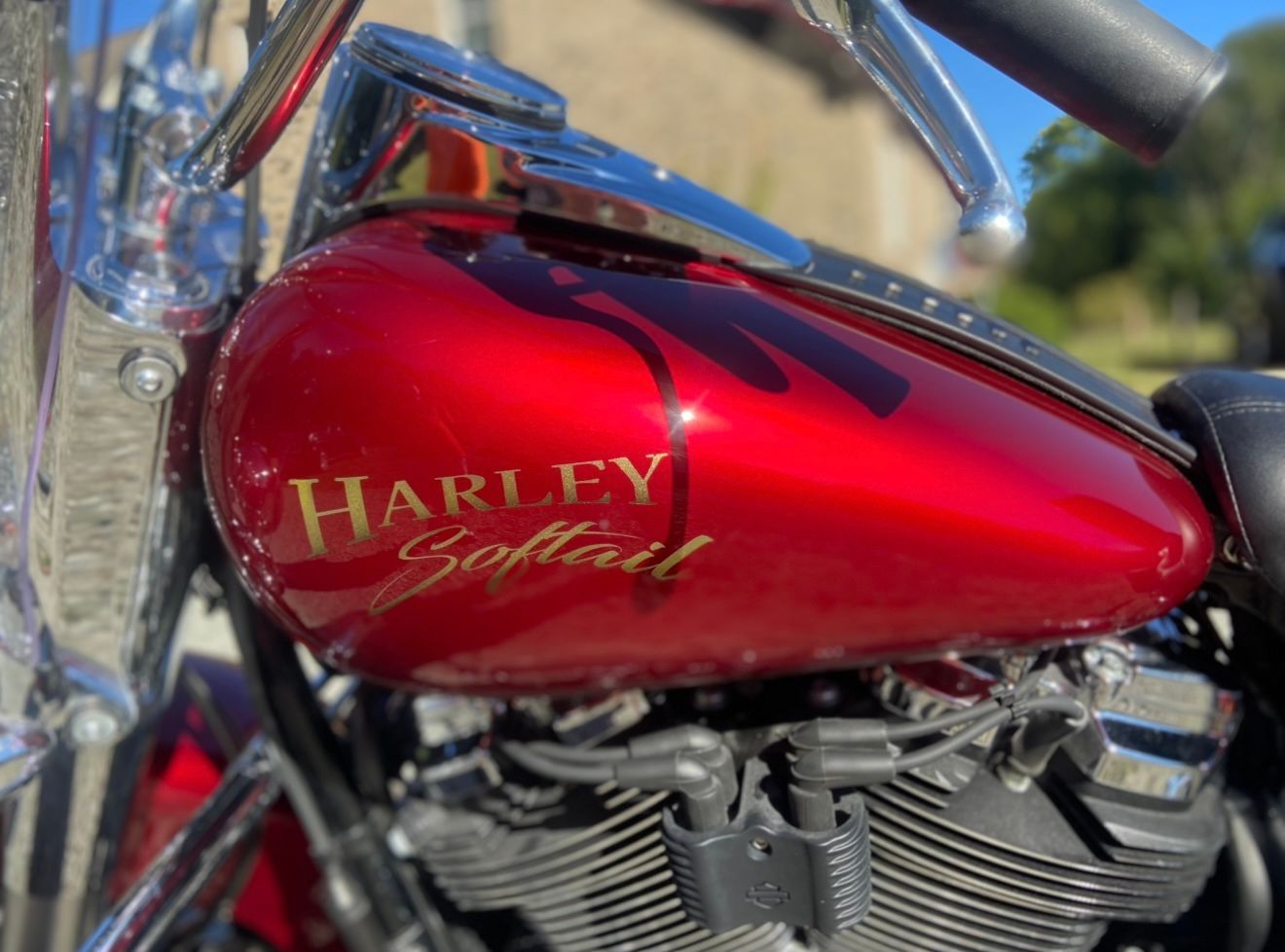 A close up of a red harley davidson motorcycle