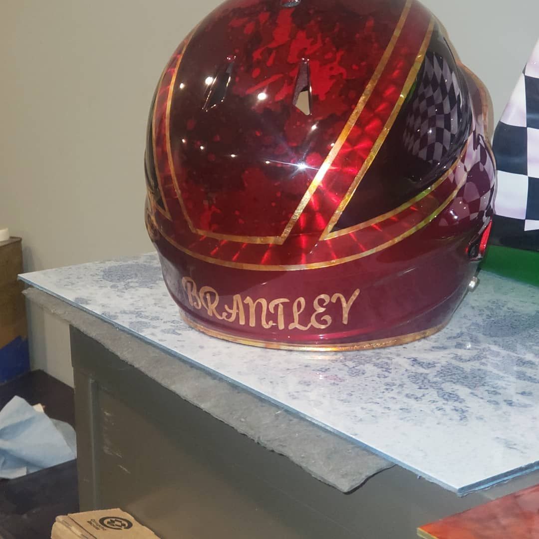 A red helmet with the name branley on it
