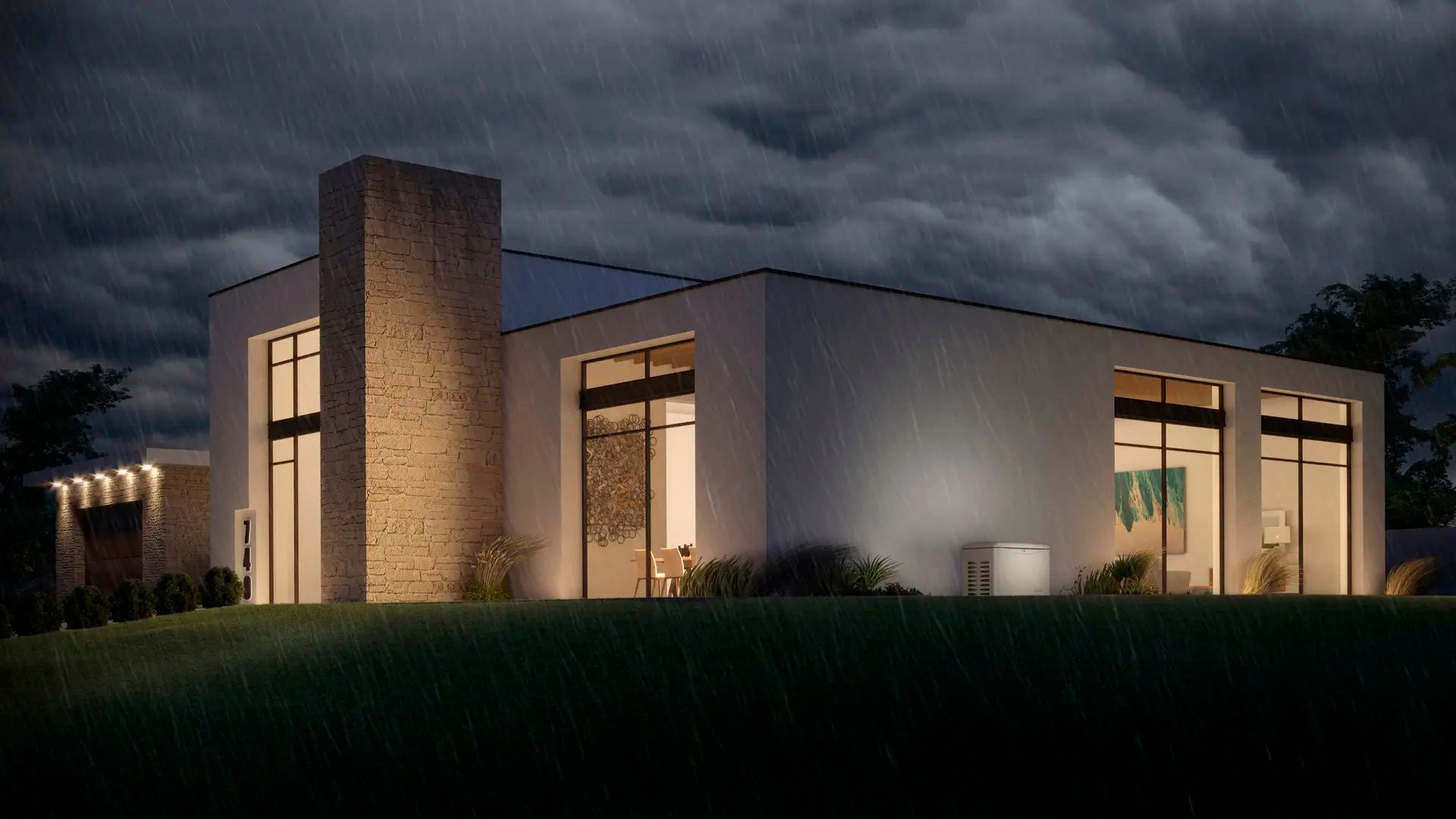 Modern white house with large windows glowing at dusk, under a stormy gray sky.
