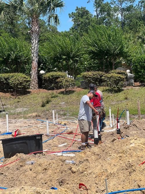 A group of men are working on a construction site.