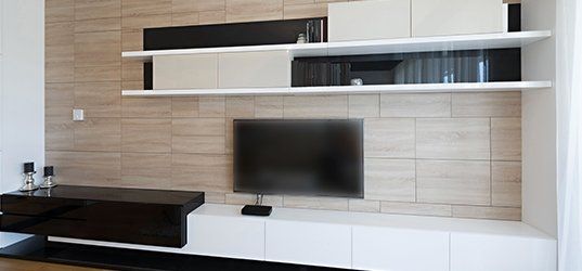 Mounted TV with shelves