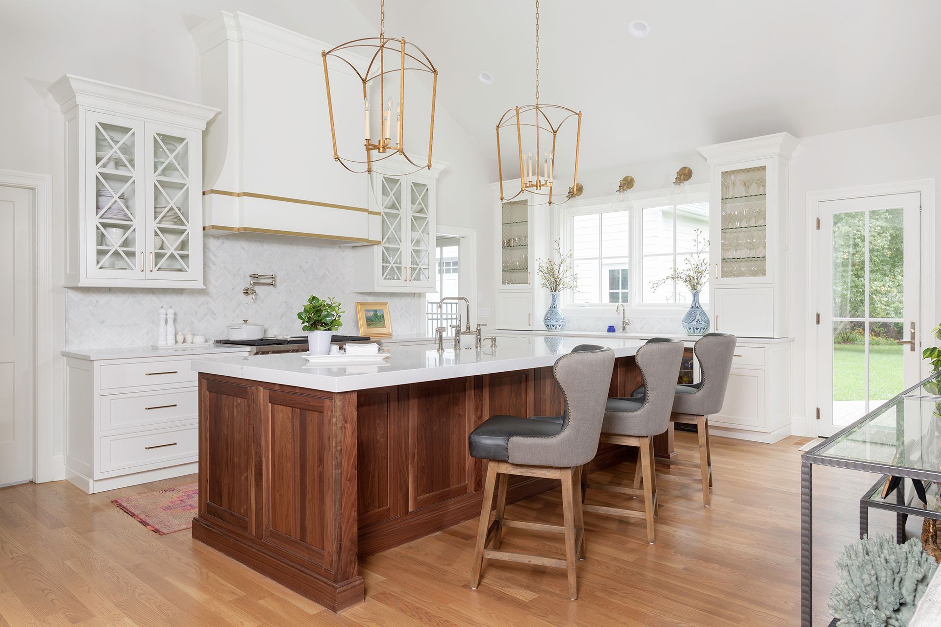 There is a large island in the middle of the kitchen.