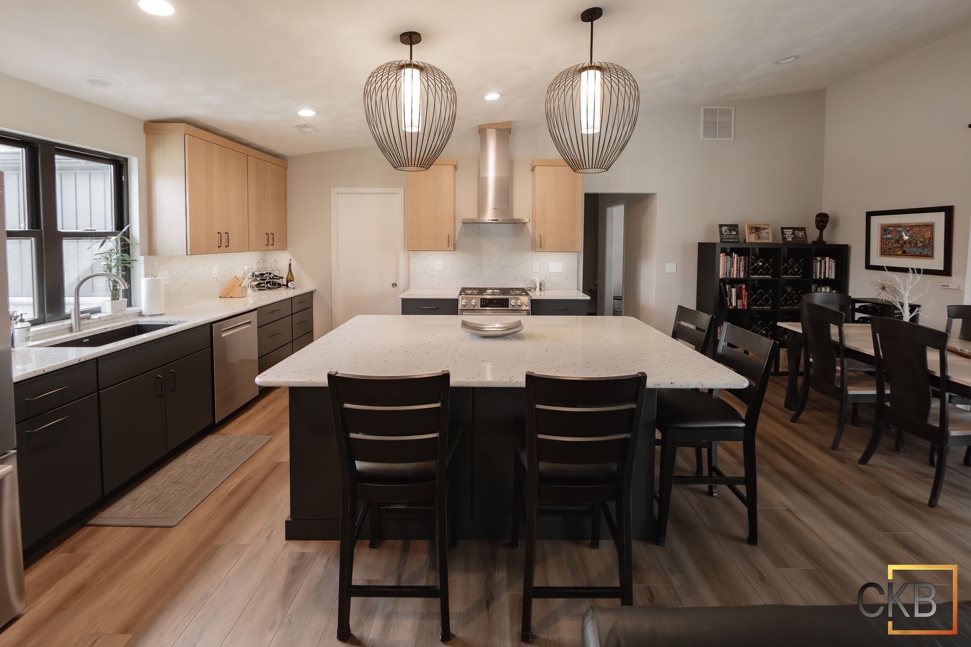 A large kitchen with a large island in the middle