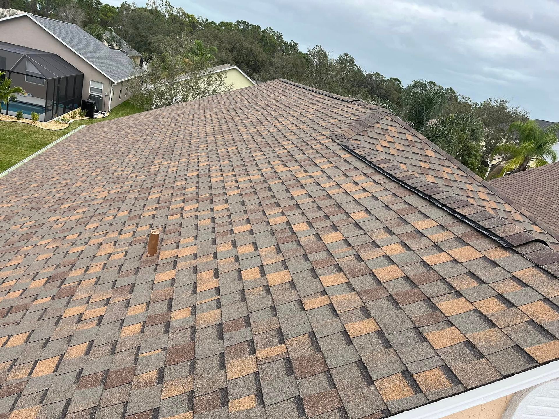 The roof of a house with a lot of shingles on it.