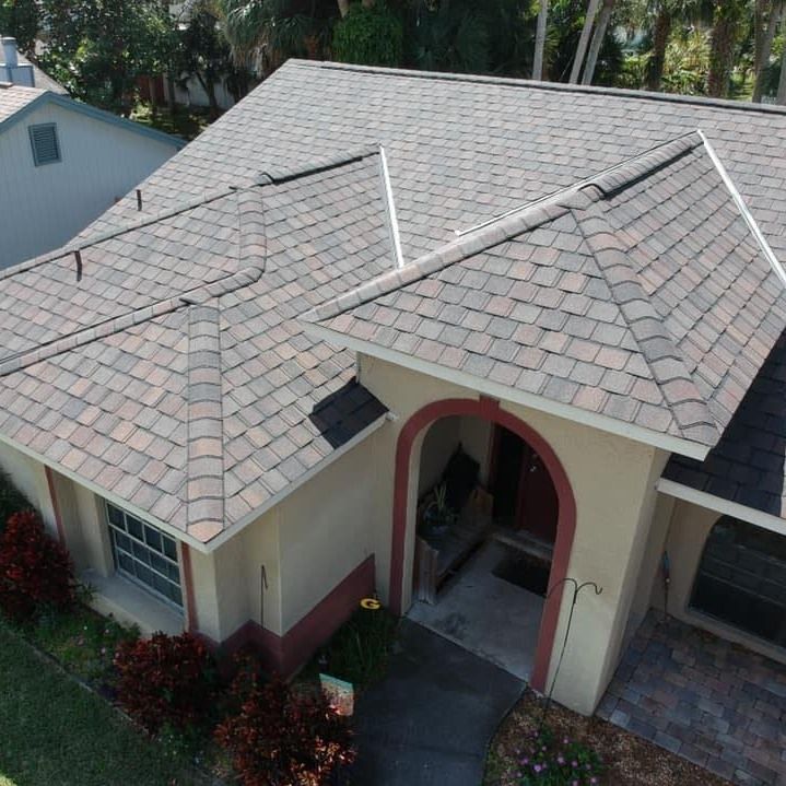 An aerial view of a house with a tiled roof