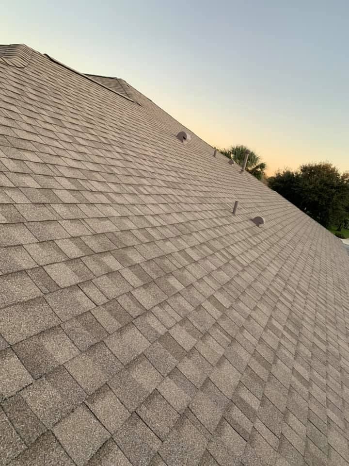 A close up of a roof with shingles on it.