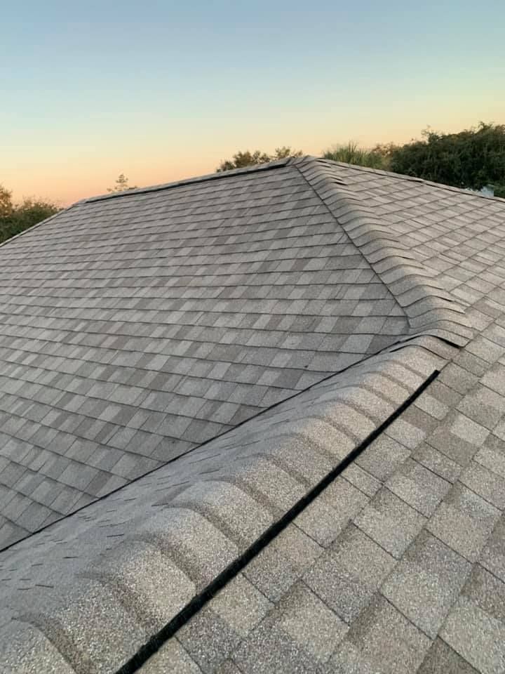 A close up of a roof with shingles on it.