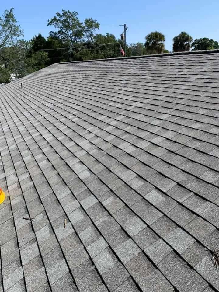 A large roof with a lot of shingles on it.