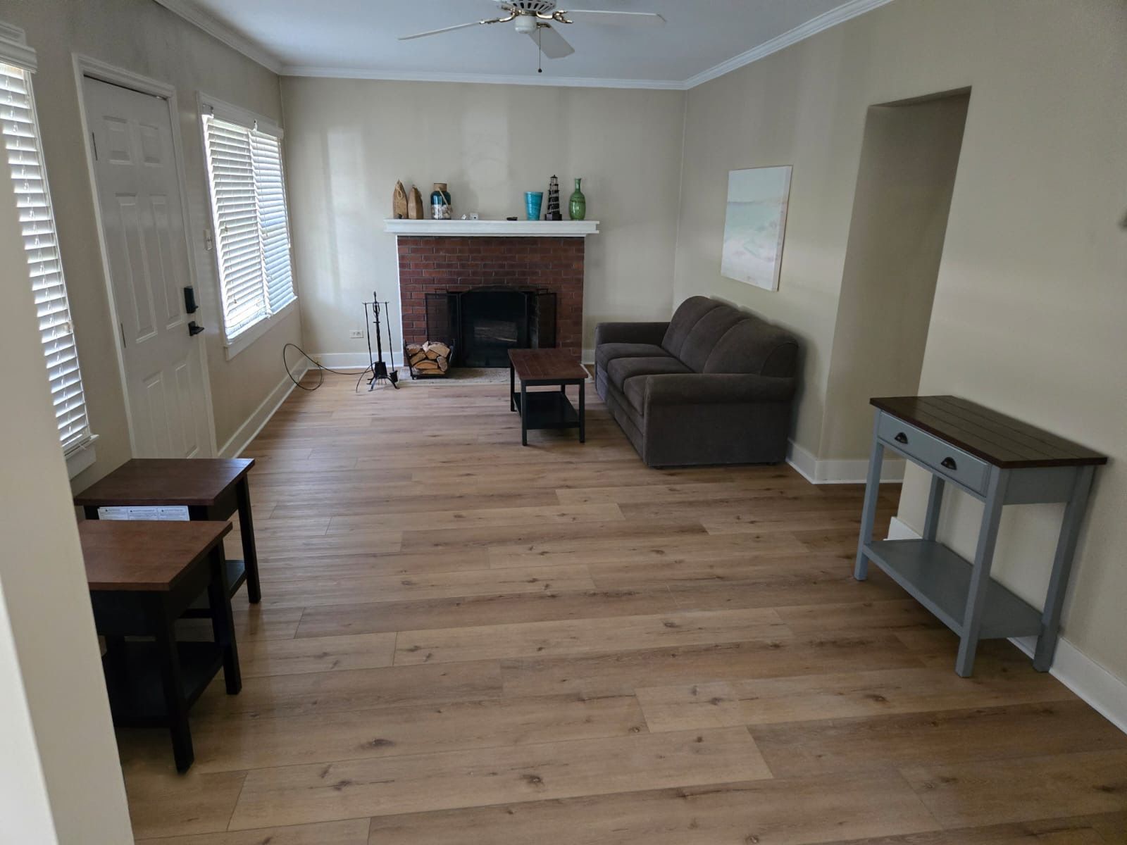 A living room featuring high-quality luxury vinyl tile flooring.
