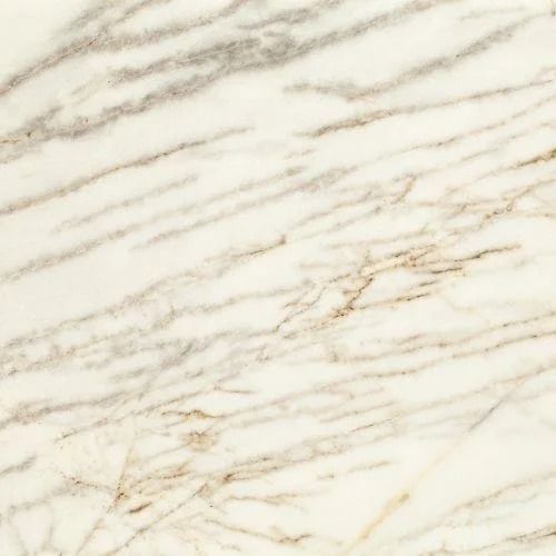 Cream-colored marble with brown and gray veining.