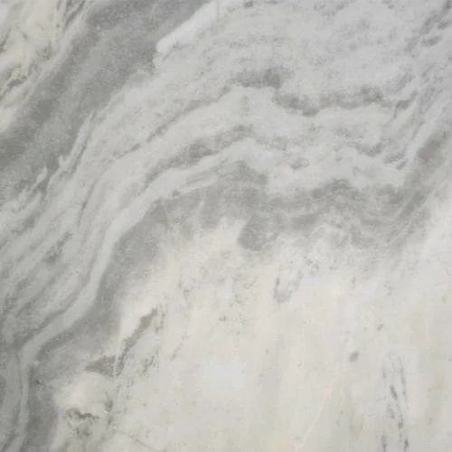 White marble with swirling gray veining.