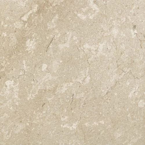 Beige-colored stone tile with textured surface and irregular patterns.