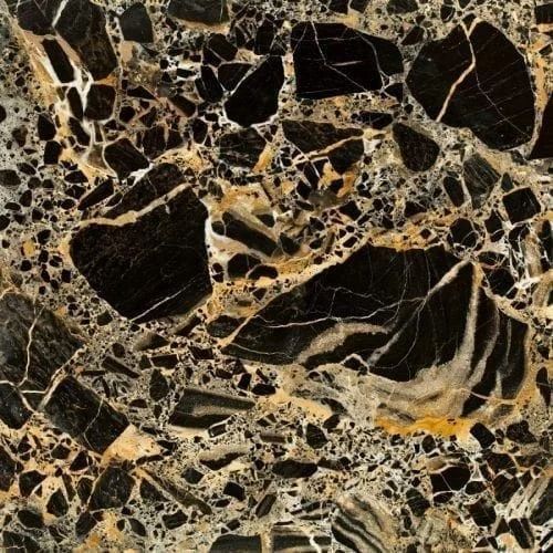 Black and gold marble surface with irregular patterns and veining.