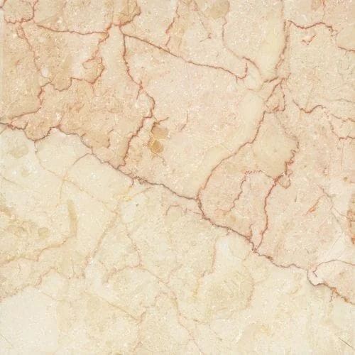 Cream-colored marble tile with tan and reddish-brown veining patterns.