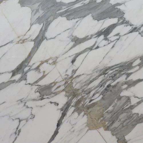 White marble with grey veining.