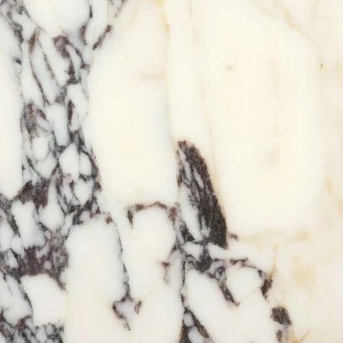 White and dark gray marbled stone surface.