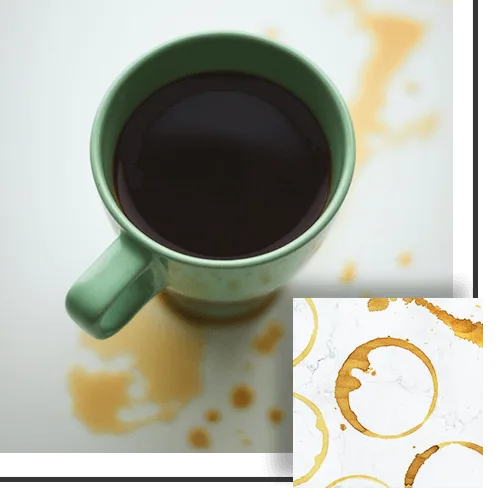 Green mug of coffee with spills on a white surface, inset of coffee ring stains.
