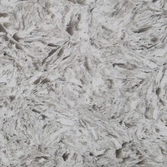 White and gray quartz countertop with swirled veining.