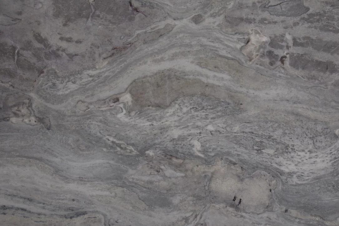 Gray and white marble with wavy, flowing patterns.