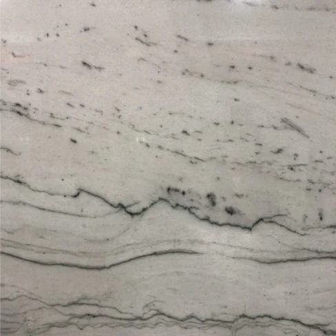 White marble with gray veins and speckles in horizontal patterns.