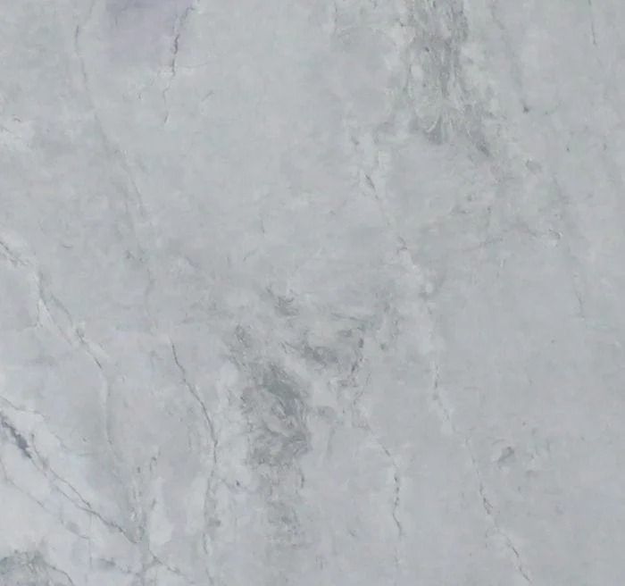 Gray and white marbled stone pattern.