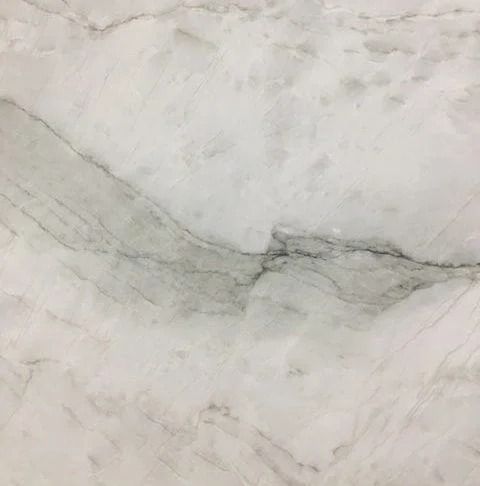 White marble slab with gray veining.