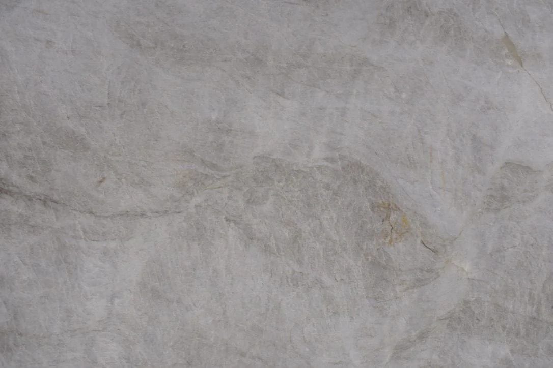 Gray marble surface with subtle veining.