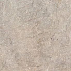 Beige-toned stone surface with irregular patterns and subtle veining.