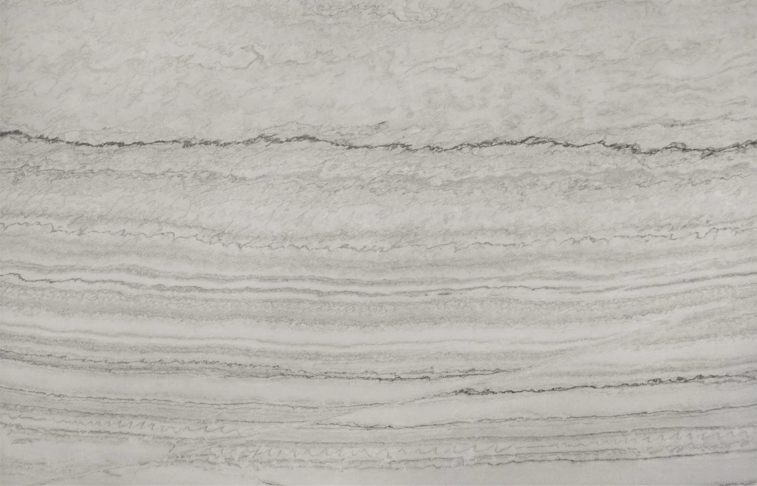 White and gray marble slab with horizontal wavy veining.